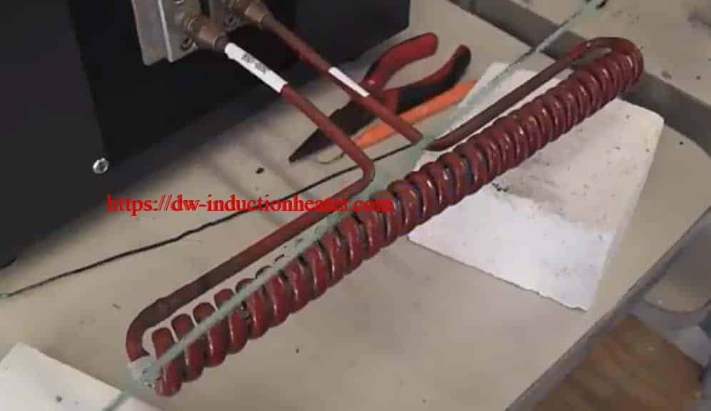 Induction inline wire heating